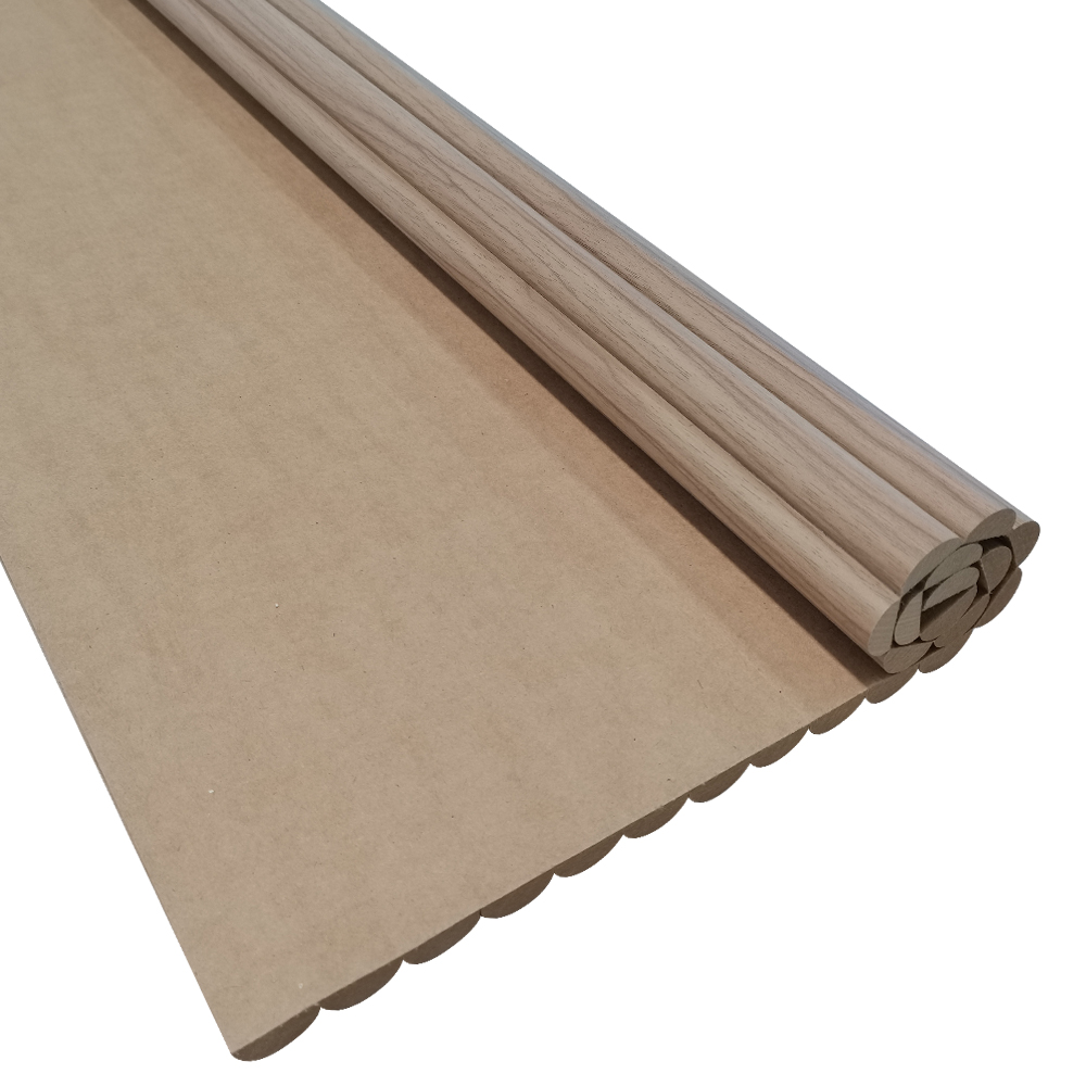 Flat view of a light-colored wood grain PVC laminated flexible MDF fluted panel sheet with extended backing
