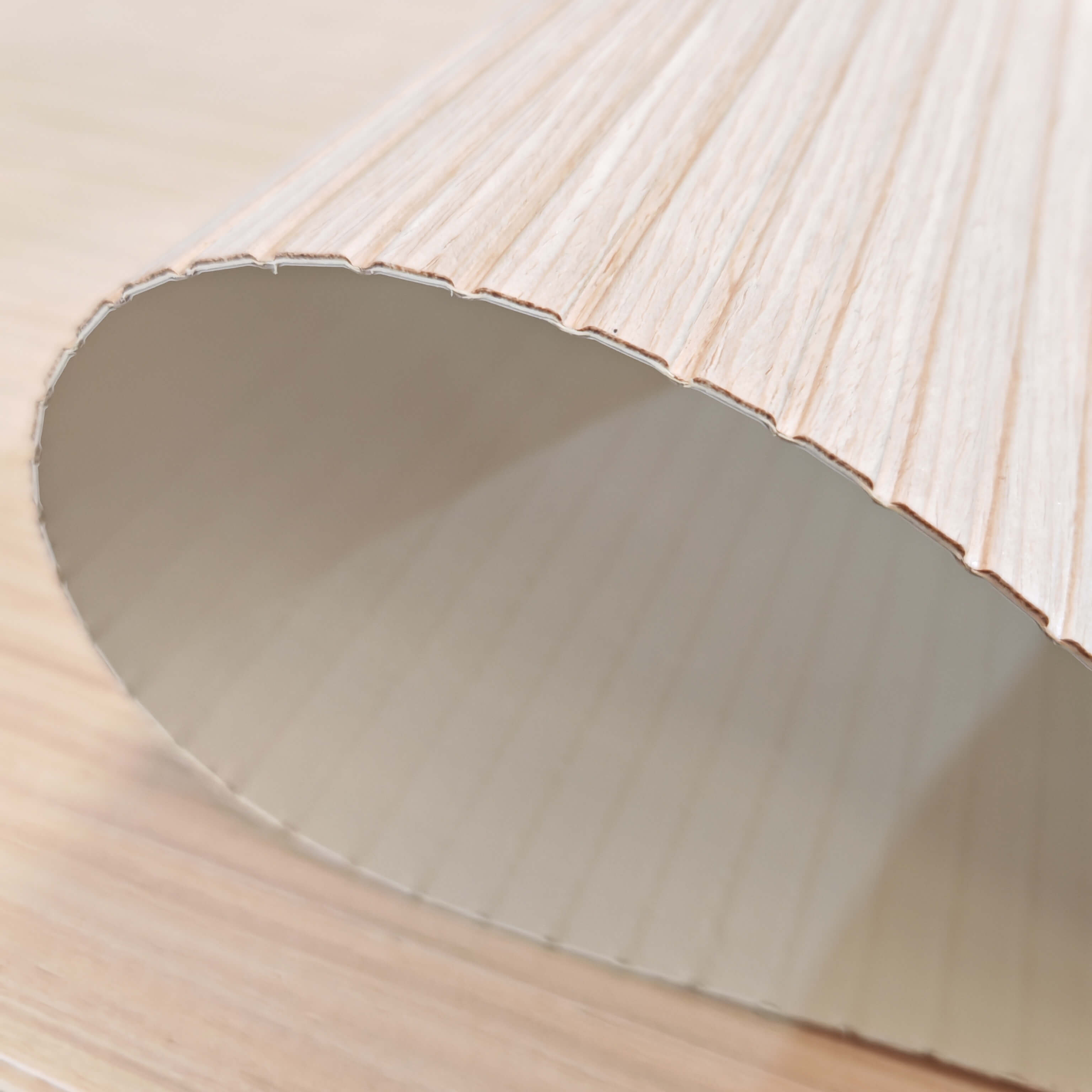 Embossed white oak wood grain texture on thin plywood