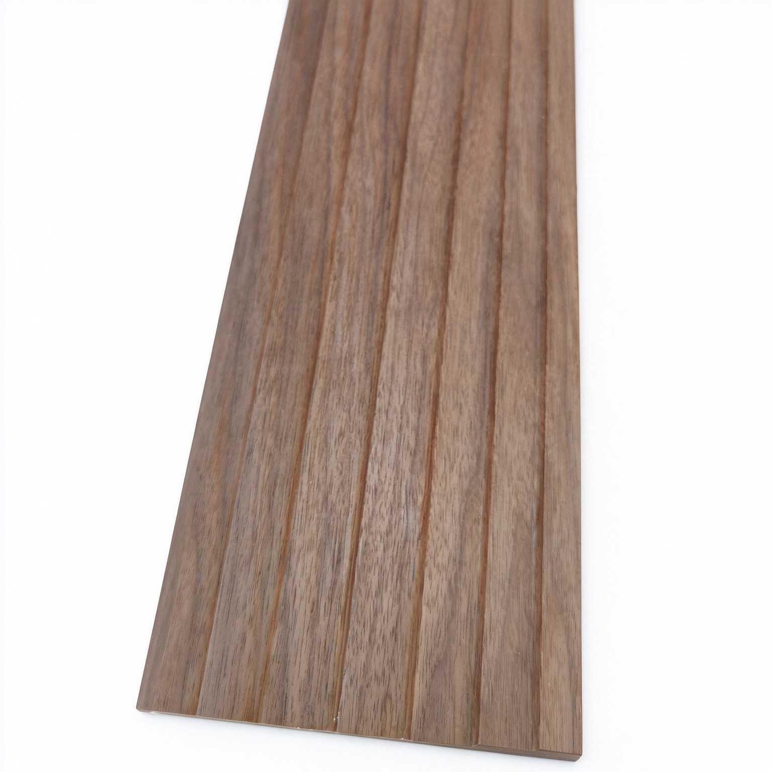 Flexible walnut veneer coated MDF tambour panel showcasing its smooth curving capability and elegant natural wood surface.